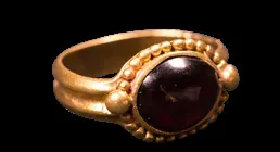 Gold rings, jeweled by almandines‌‌
