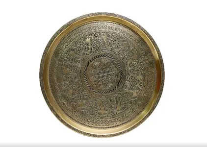 Where were geometric motifs most often used in copper chasing?