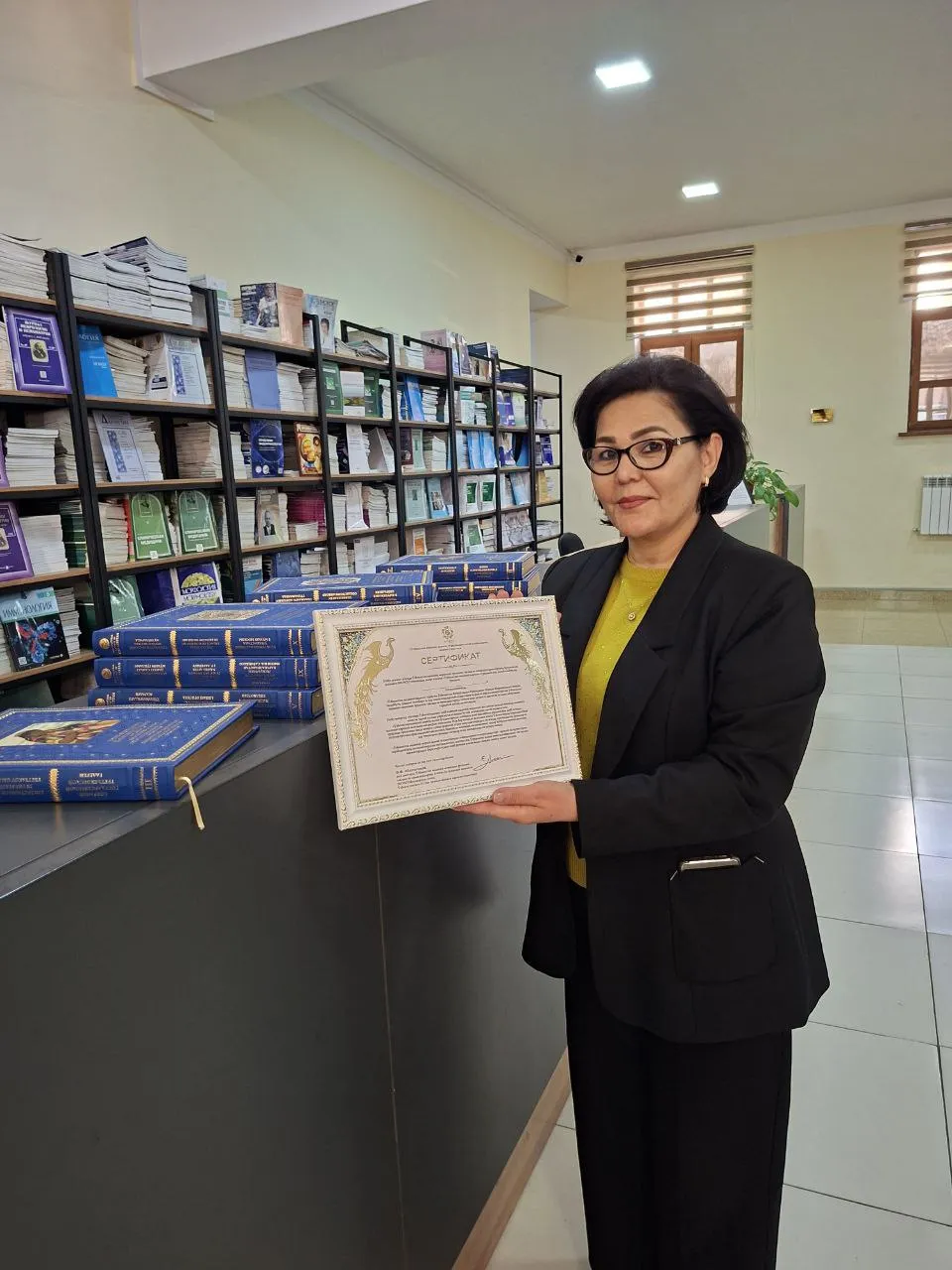 WOSCU continues to share "Cultural Heritage of Uzbekistan" books throughout Samarkand