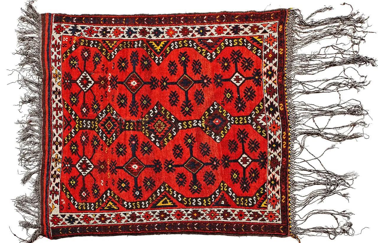 Why have Uzbek weddings been associated with carpet making since ancient times?